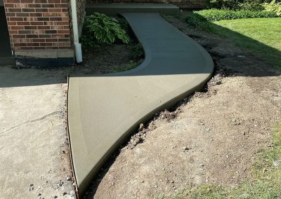 Broom Finished Concrete Entryway Sidewalk