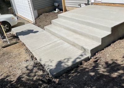 Broom Finished Concrete Entryway Sidewalk & Stairs