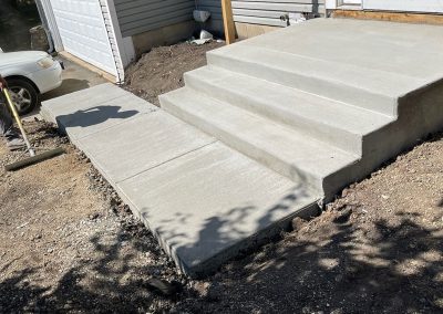 Broom Finished Concrete Entryway Sidewalk & Stairs