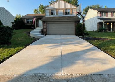 Broom finished concrete driveway with stairs