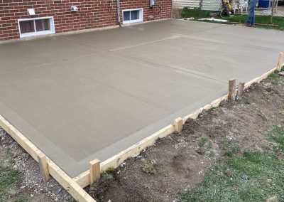 Broom finished concrete patio with smooth border