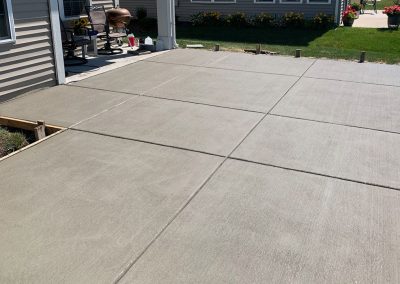 Traditional broom finished concrete patio