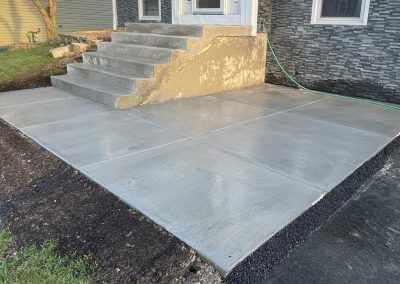 Broom finished concrete stairs and porch