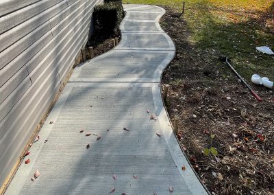 Broom finished concrete walkway with smooth border