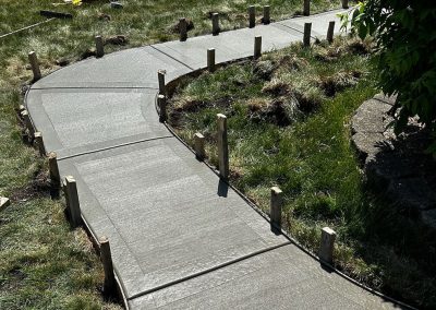 California broom finished concrete walkway
