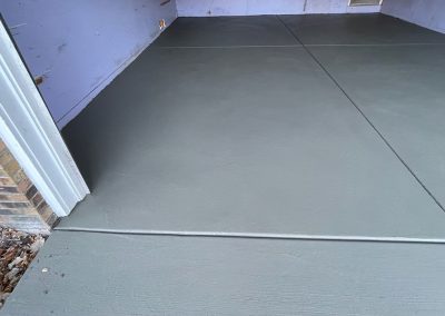 Concrete garage floor and driveway