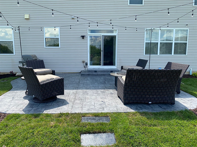 Stamped Concrete Patio with Furniture