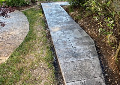 Wood stamped concrete walkway