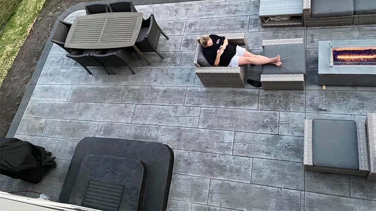 Wood and stone stamped concrete patio finished with furniture Wood and stone stamped concrete patio finished with furniture