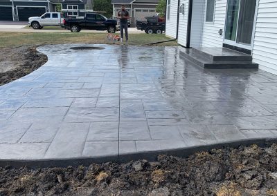 Stamped concrete patio with firepit spot