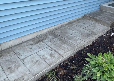 Stamped concrete walkway and stoop