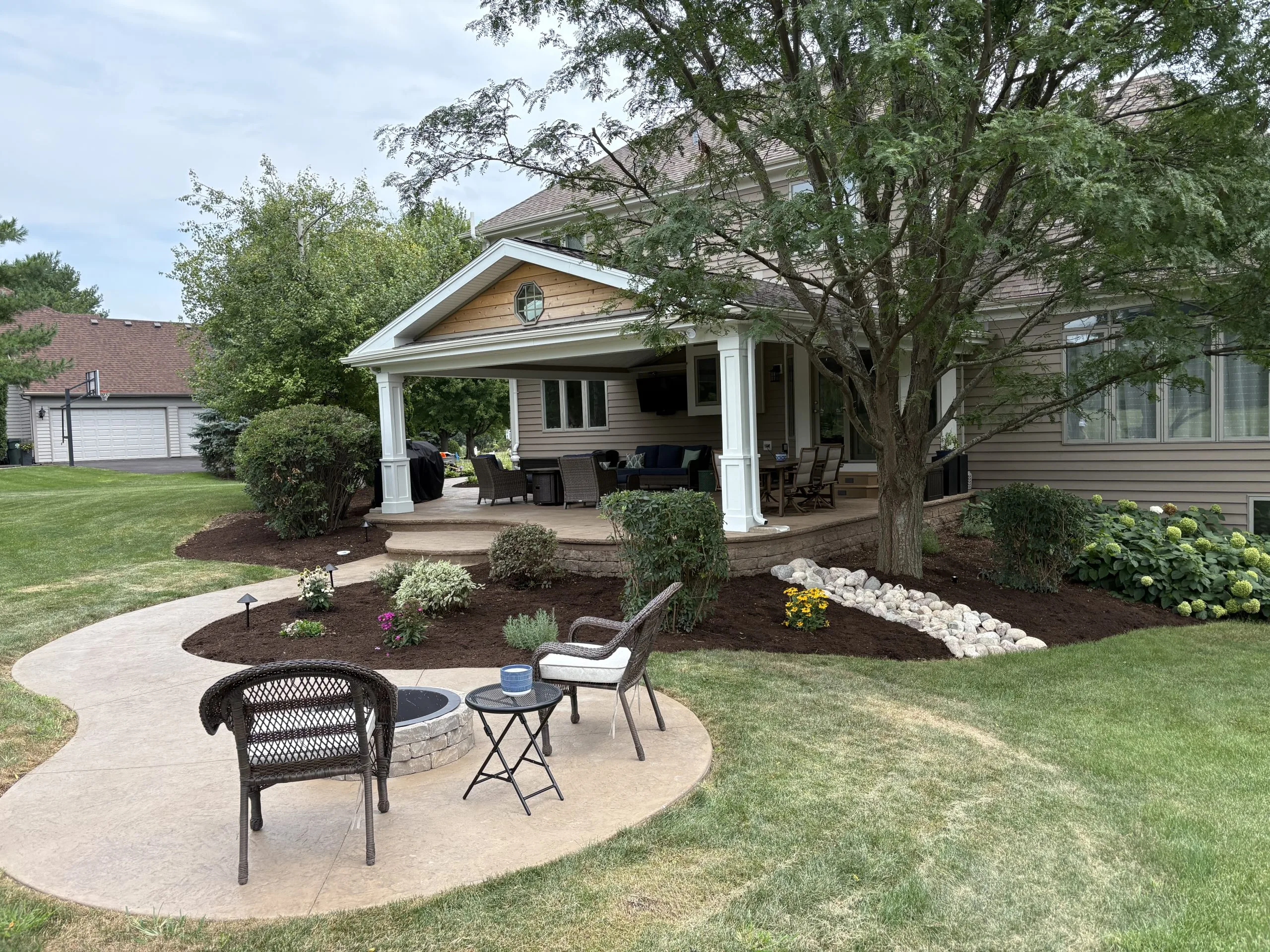 stamped concrete with brick retaining walls with walkway to fire pit stamped concrete with brick retaining walls with walkway to fire pit