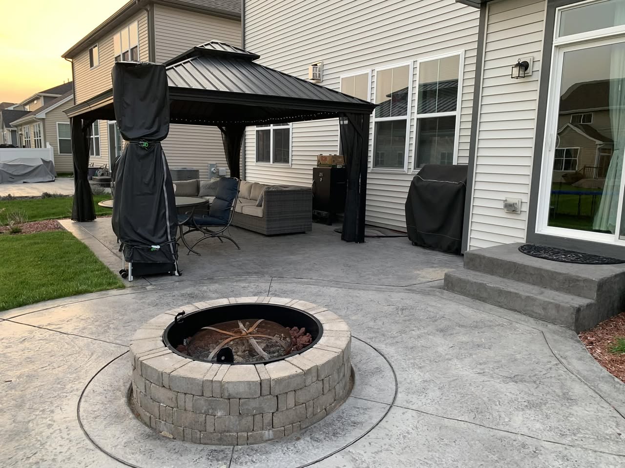 carm taglia stamped patio and brick fire pit